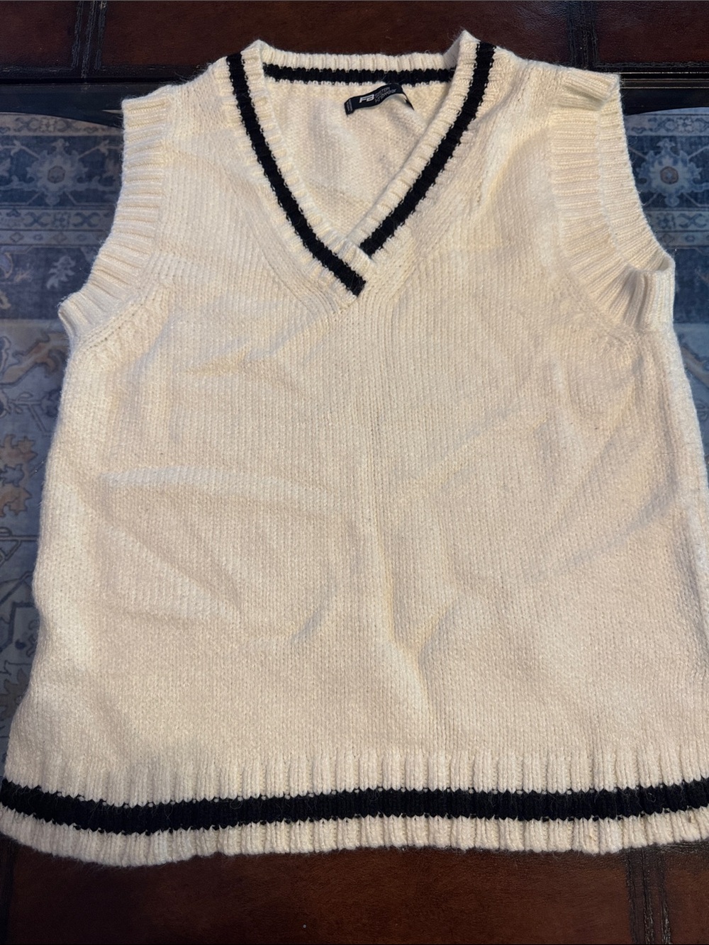 Sleeveless V-Neck Sweater Vest in Cream with Black Trim